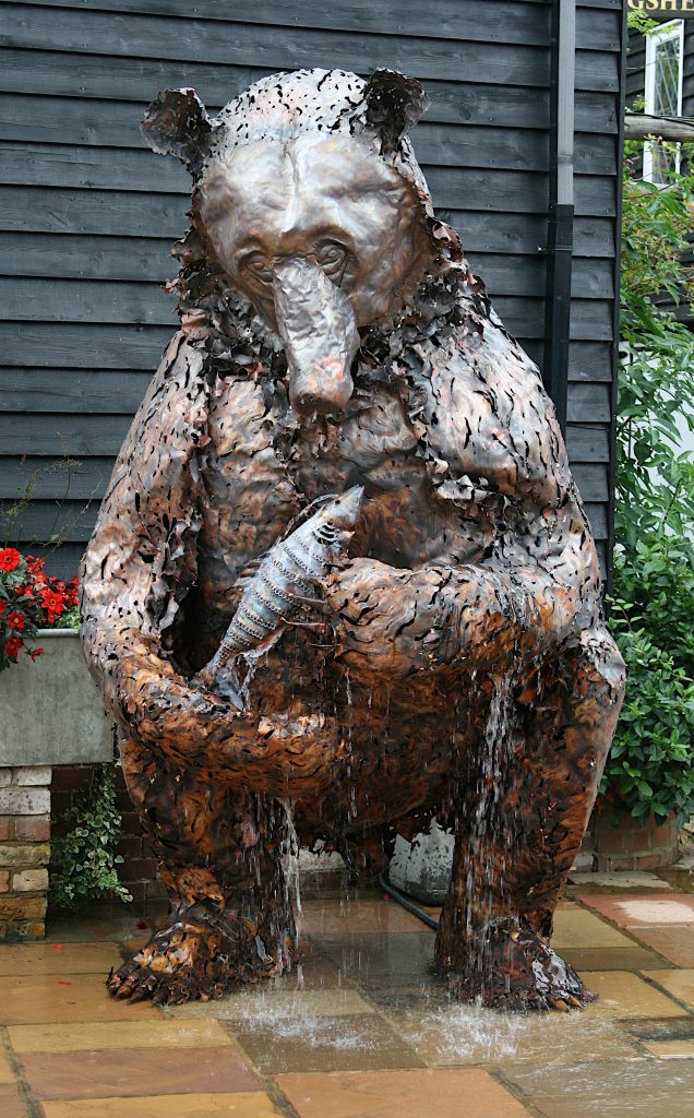 bear and salmon sculpture