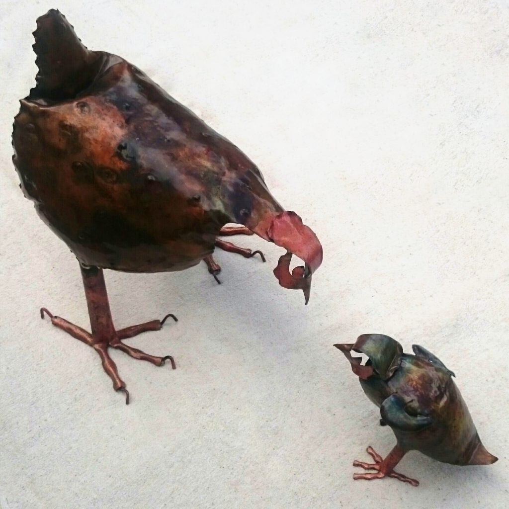 chicken and chick sculpture