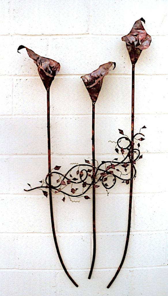 arum lily trio with vine sculpture
