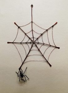 spider and web sculpture