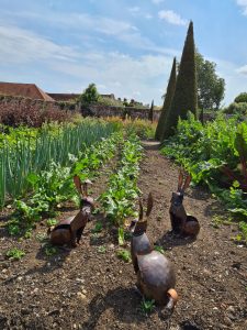 Emily Stone copper rabbit group sculpture Godinton