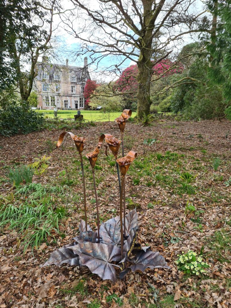 Emily Stone copper Arum Lilies sculpture w house