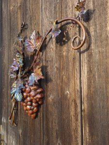 Emily Stone copper Grapes and Vine sculpture angle